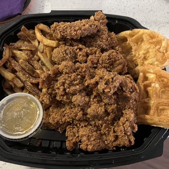 MoCo's Founding Farmers - Spicy Fried Chicken and waffles with fries - New American Near Me - Potomac, Maryland MoCo's Founding Farmers - Spicy Fried Chicken and waffles with fries - New American Near Me - Potomac, Maryland