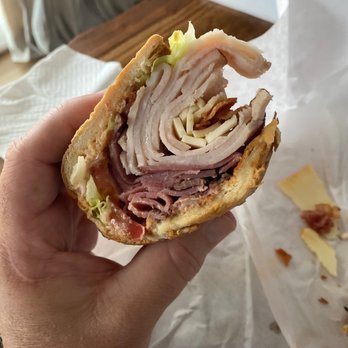 Steve's Beer Wine - a hand holding a sandwich - Beer, Wine & Spirits Near Me - Gaithersburg, Maryland Steve's Beer Wine - a hand holding a sandwich - Beer, Wine & Spirits Near Me - Gaithersburg, Maryland