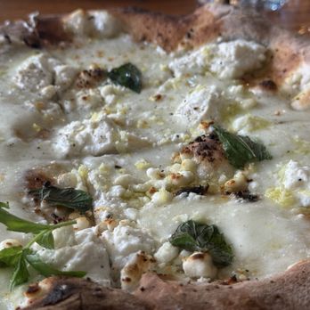 Shelter - White pizza - ricotta,goat cheese, mozz, yellow&green zucchini, mint, lemon zest - Pizza Near Me - Woodstock, New York Shelter - White pizza - ricotta,goat cheese, mozz, yellow&green zucchini, mint, lemon zest - Pizza Near Me - Woodstock, New York