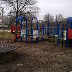 Stringtown Park - Playground is about a foot lower than the surrounding lawn