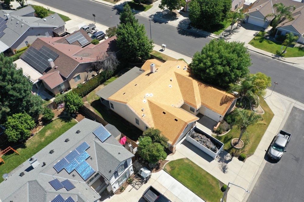 Slide of Roof Pros Roofing