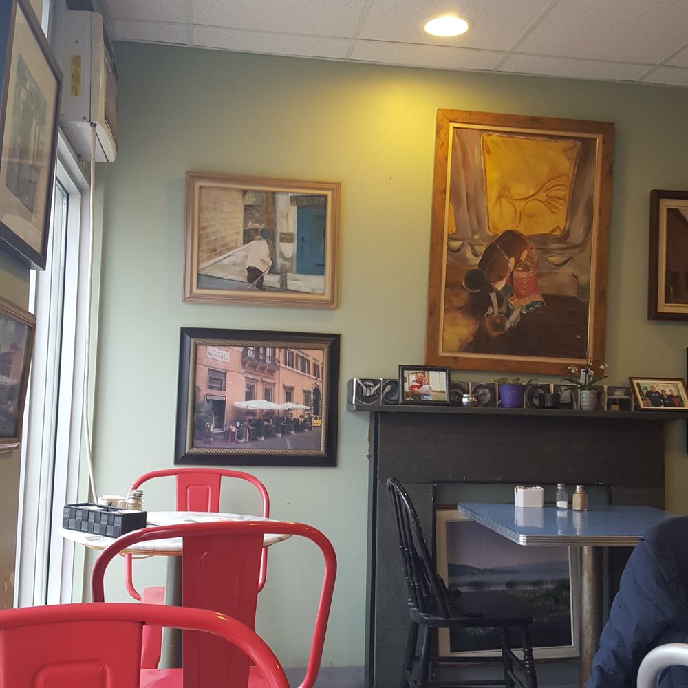 Annie's Place Cafe - a woman sitting at a table - Caterers Near Me - Halifax, Nova Scotia Annie's Place Cafe - a woman sitting at a table - Caterers Near Me - Halifax, Nova Scotia