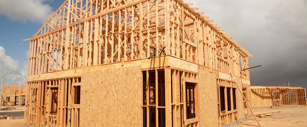 TM Custom Homes & Remodeling Logo