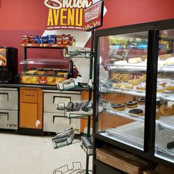 Many snacks like tornadoes, donuts, sandwiches, nachos ect.