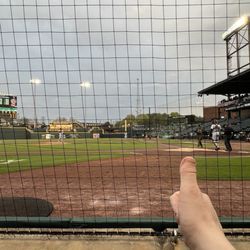 Truist Stadium - Behind home plate at Truist Stadium. Also my thumb.