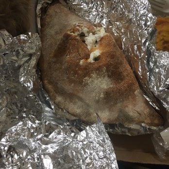 Jojo's Pizza - a piece of pizza wrapped in tin foil - Pizza Near Me - Brooklyn, New York Jojo's Pizza - a piece of pizza wrapped in tin foil - Pizza Near Me - Brooklyn, New York