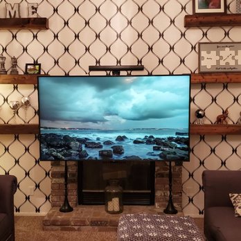 Infinity Home Services - Lowered down over fireplace - Home Theatre Installation Near Me - Paso Robles , California