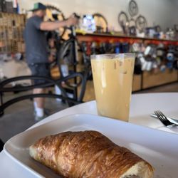 Pedal & Pour - Toffee nut and brown sugar ice latte and butter croissant