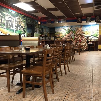 Casa Leon - Inside the restaurant --Christmas tree set up. - Mexican Near Me - Jacksonville, Florida