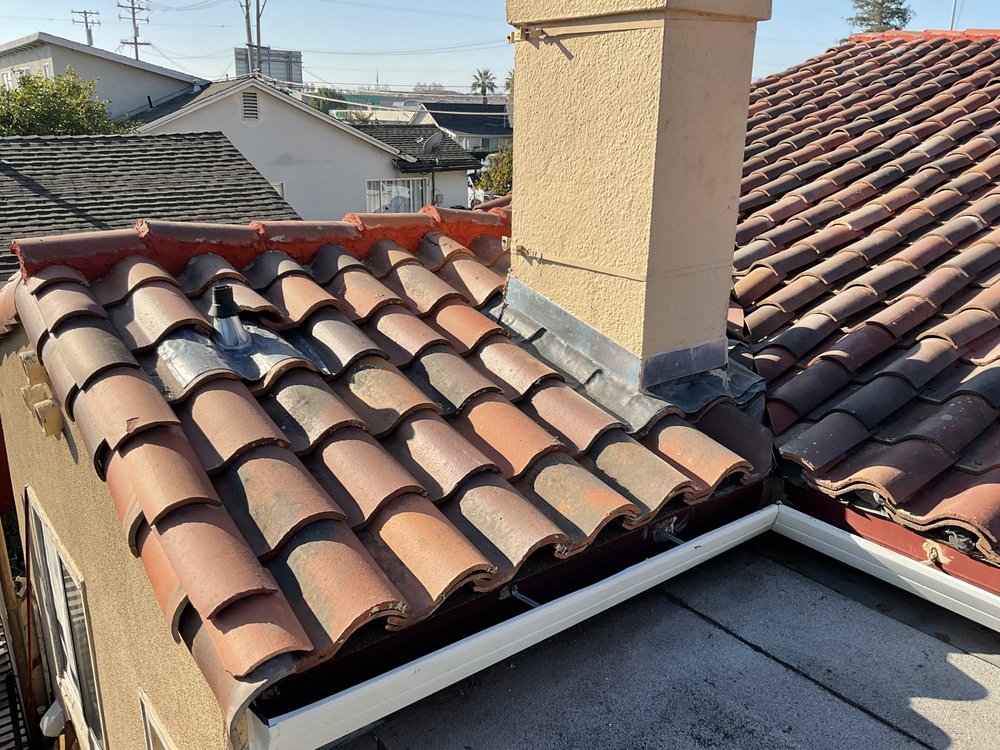 Slide of Victor A. Lopez Roofing