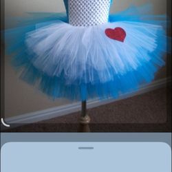 River Forest Cleaners & Tailors - Birthday dress for a baby I will be hand making most of the dress I am looking for you to sew where and cut the tulle like in the picture?