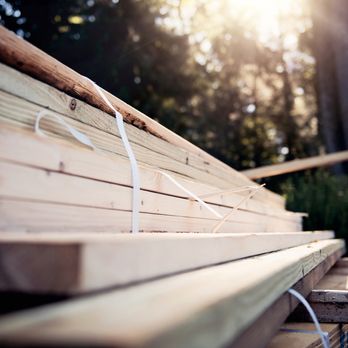 Amerson Renovation - a close up of a pile of lumber - General Contractors Near Me - Great Neck, New York Amerson Renovation - a close up of a pile of lumber - General Contractors Near Me - Great Neck, New York