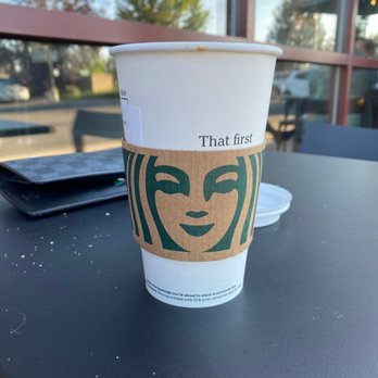 Starbucks - a cup of coffee with the words that first - Coffee & Tea Near Me - Kalispell, Montana