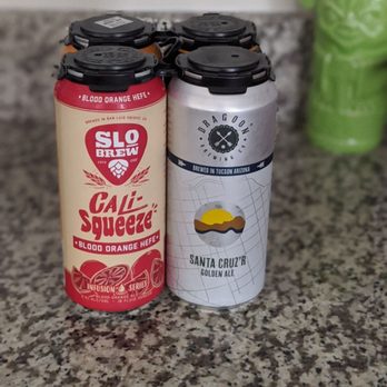Caps & Corks - two cans of soda on a counter - Wine Bars Near Me - Tucson, Arizona