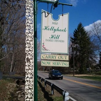 Hollyhock Hill - Hollyhock Hill sign on College Avenue. - American Near Me - Indianapolis, Indiana