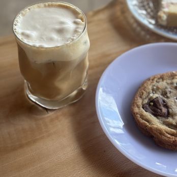 Elevenses - Iced creamsicle (orange vanilla flavor) decaf latte with honey cold foam - Bakeries Near Me - Tampa Bay, Florida