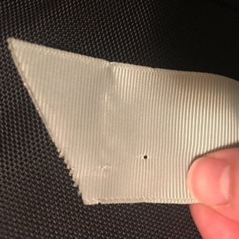 University Dry Cleaners - Two holes where the tag was attached. This was on the end of a sash for my dress. The dress is light colored, therefore very noticeable. - Dry Cleaning Near Me - Detroit, Michigan University Dry Cleaners - Two holes where the tag was attached. This was on the end of a sash for my dress. The dress is light colored, therefore very noticeable. - Dry Cleaning Near Me - Detroit, Michigan
