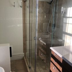 Colorado Glass and Mirror - Final look: two rolling glass doors with refectory aligned corner