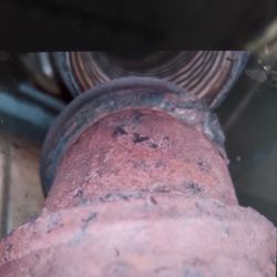 Old Fashioned Auto Repair - Before their job with catalytic converter