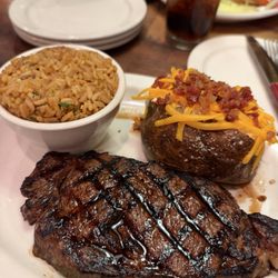 Texas Roadhouse - Fort Ft. Worth Ribeye* with loaded baked potato & Seasoned Rice