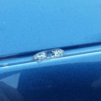 Avis - Another piece of what seems to be glue attached to the car - Car Rental Near Me - Los Angeles, California