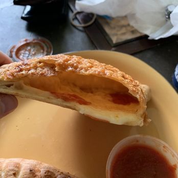 Pizza Hut - a hand holding a piece of bread - Pizza Near Me - Fort Johnson, Louisiana Pizza Hut - a hand holding a piece of bread - Pizza Near Me - Fort Johnson, Louisiana