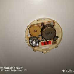 Gold Home Inspection - Smoke alarm, without the battery.