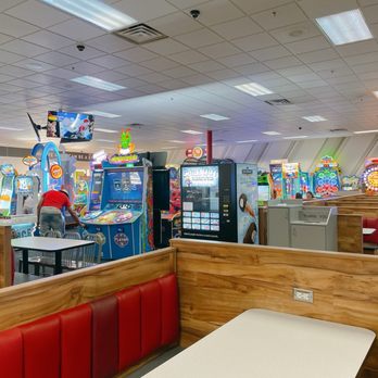 Chuck E. Cheese - Lots of seating (part of game room shown) - Pizza Near Me - Grand Rapids, Michigan