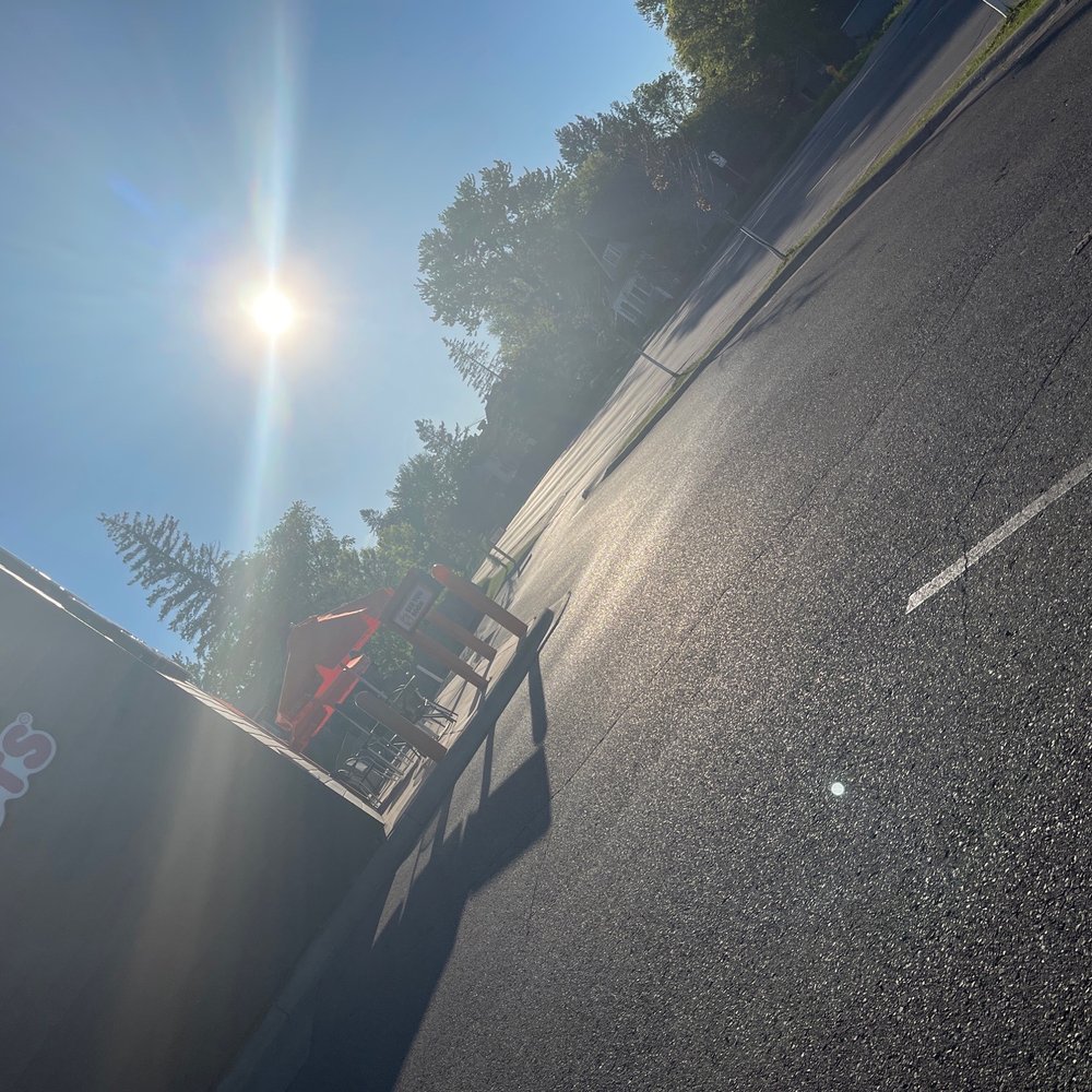 Dunkin' - a person riding a skateboard down a street - Donuts Near Me - Duluth, Minnesota Dunkin' - a person riding a skateboard down a street - Donuts Near Me - Duluth, Minnesota