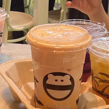 Mini Monster Cafe - Thai tea. The cotton candy was devour quickly and probably the yummiest out of all drinks. Sunrise passion fruit tea and strawberry milk. - Bubble Tea Near Me - Anaheim, California