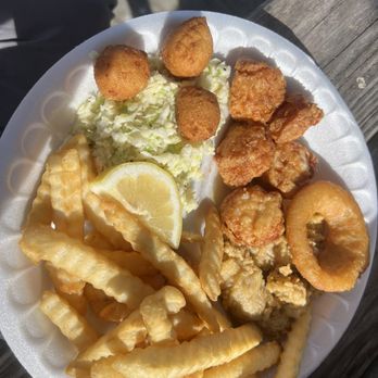 Waterfront Seafood Shack - Combo platter, oysters, scallops, Fries, Hush puppies and slaw. - Seafood Near Me - Calabash, North Carolina Waterfront Seafood Shack - Combo platter, oysters, scallops, Fries, Hush puppies and slaw. - Seafood Near Me - Calabash, North Carolina