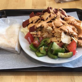 Garlic 'n Lemons - Mixed Shawarma plate - Spicy Chicken and Spicy Beef, Greek Salad, Garlic sauce and Rice w/ pita on the side. - Middle Eastern Near Me - Boston, Massachusetts