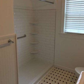 Coastal Bay Construction - a shower and toilet in a bathroom - General Contractors Near Me - Delmar, Delaware Coastal Bay Construction - a shower and toilet in a bathroom - General Contractors Near Me - Delmar, Delaware