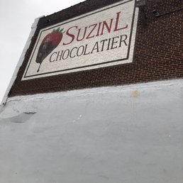 a sign on the side of a building