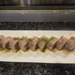 Destiny roll salmon avo and topped with yellowtail. Destiny roll salmon avo and topped with yellowtail.
