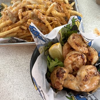 Coco's Crush Bar and Grill OG - Firecracker Shrimp and old bay fries - Tiki Bars Near Me - Clearwater, Florida Coco's Crush Bar and Grill OG - Firecracker Shrimp and old bay fries - Tiki Bars Near Me - Clearwater, Florida