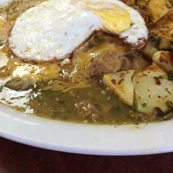 Rodeo Cafe - A close up of heuvos rancheros with chili verde. O.M.G!!!! - Breakfast & Brunch Near Me - Norco, California Rodeo Cafe - A close up of heuvos rancheros with chili verde. O.M.G!!!! - Breakfast & Brunch Near Me - Norco, California