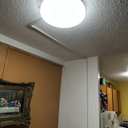 Apex Veteran Builders - Upgrade dinner room light fixture and added a switch to control the light