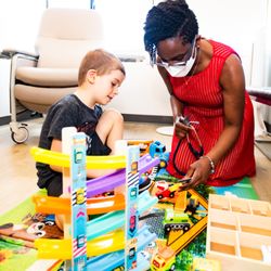 Latitude Food Allergy Care - Dr. Joanne Moreau with a young patient