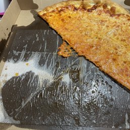 a half eaten pizza in a box