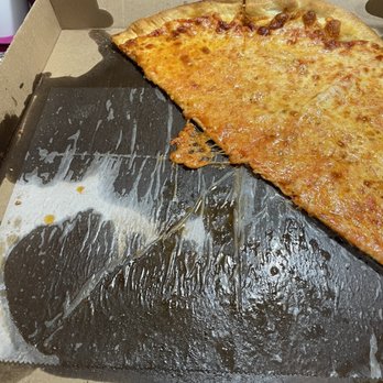 Crespo's Express - a half eaten pizza in a box - Pizza Near Me - Jackson Township, New Jersey