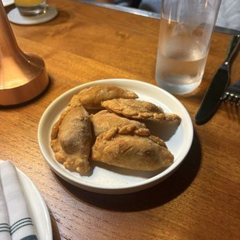 Quinto - Empanadas for free! So sweet. - Steakhouses Near Me - Miami, Florida