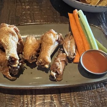 Tavern in the Square - Chicken wings with buffalo sauce on the side - Breakfast & Brunch Near Me - Framingham, Massachusetts Tavern in the Square - Chicken wings with buffalo sauce on the side - Breakfast & Brunch Near Me - Framingham, Massachusetts
