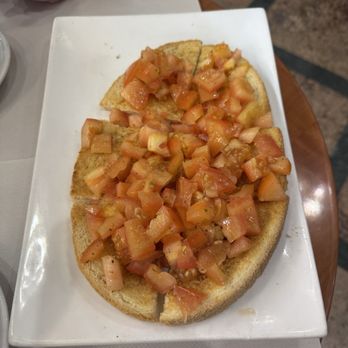 Caffè dell'Opera - Bruschetta... see how the tomatoes are not juicy red in color... they were also not juicy in taste since they were not ripe - Cafes Near Me - Milan, Michigan