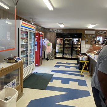 Seven Seas Seafood Market - a man standing in front of a vending machine - Seafood Markets Near Me - Murrells Inlet, South Carolina