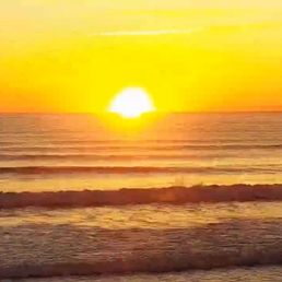 Waves breaking at sunrise at Nantasket Beach