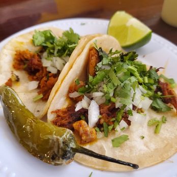 La Cabañita - two tacos on a plate - Mexican Near Me - Little Rock, Arkansas La Cabañita - two tacos on a plate - Mexican Near Me - Little Rock, Arkansas