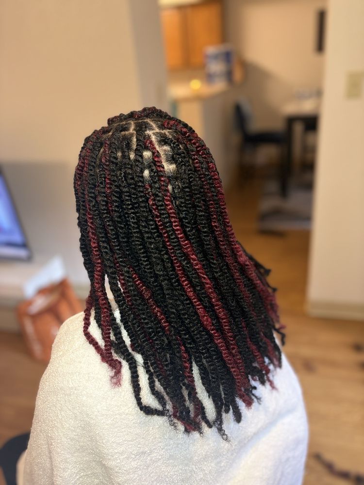 Michelle’s Braiding Hair Logo