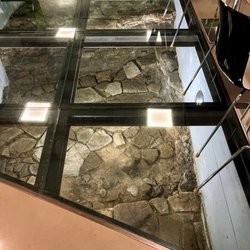 Urban Hotel Design - Floor in the breakfast room showing the remains of an excavation