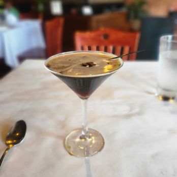 Samba Loca - a martini in a glass on a table - Brazilian Near Me - Carrollton, Georgia Samba Loca - a martini in a glass on a table - Brazilian Near Me - Carrollton, Georgia